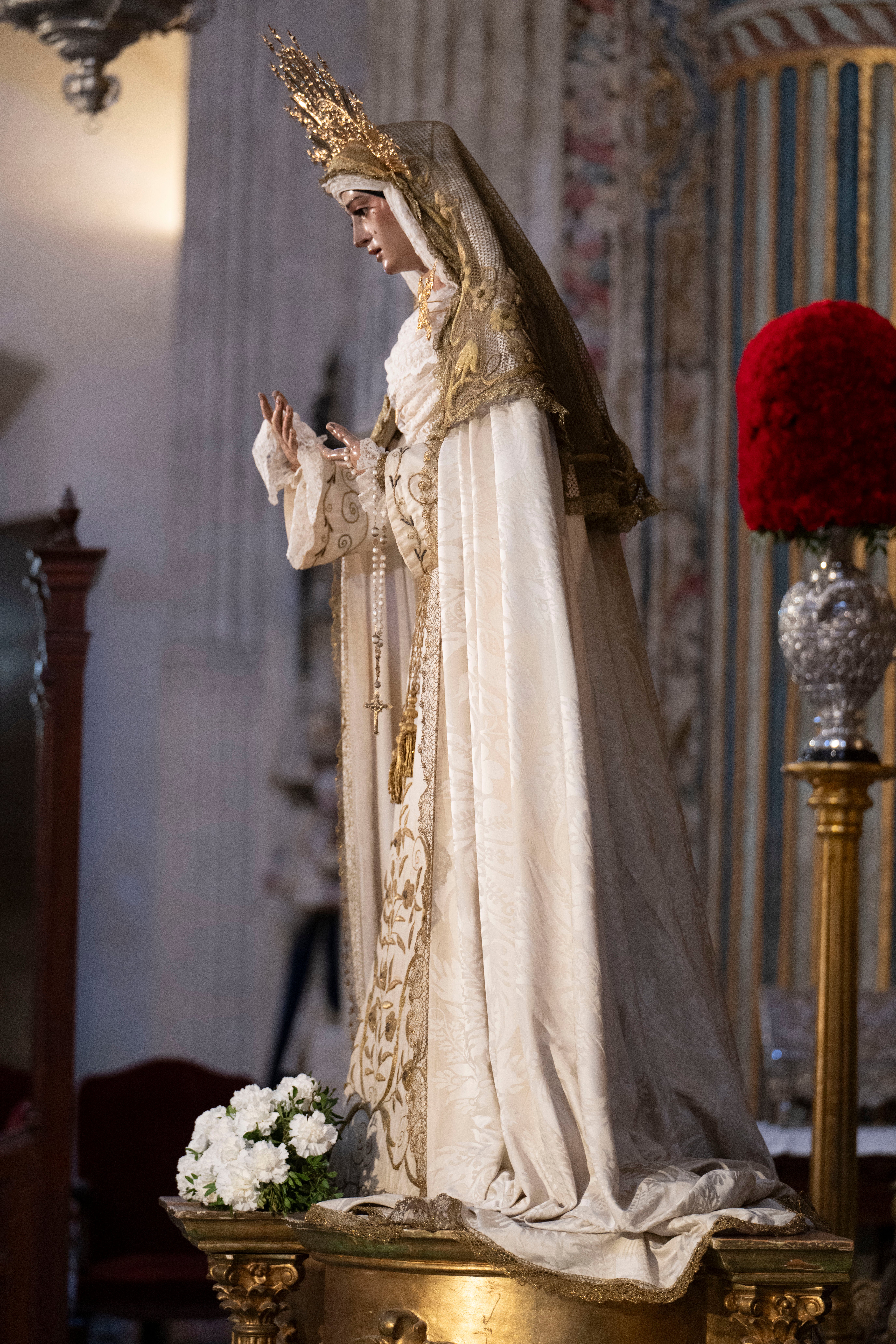 Los titulares del Amor, en el retablo mayor del Salvador