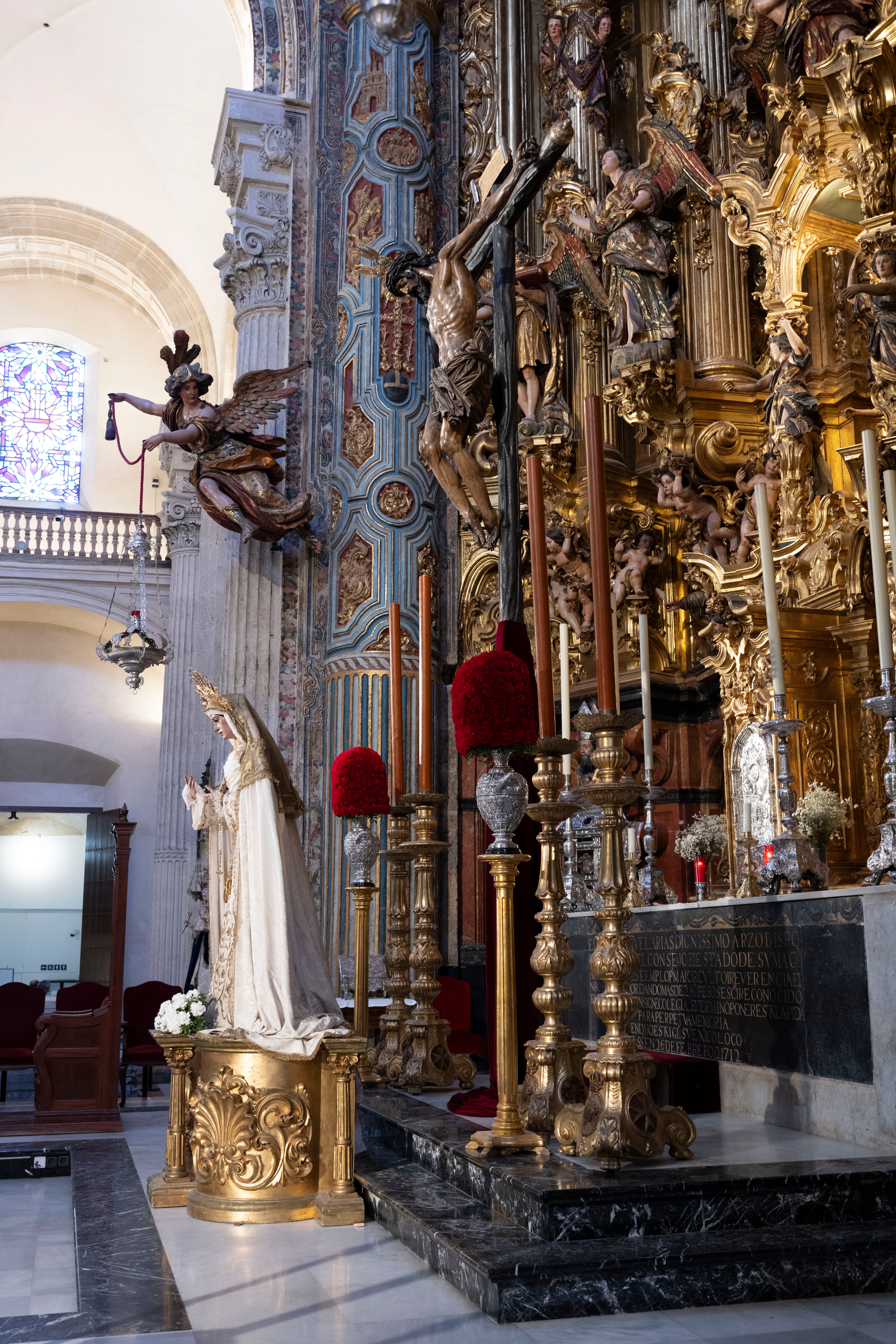 Los titulares del Amor, en el retablo mayor del Salvador