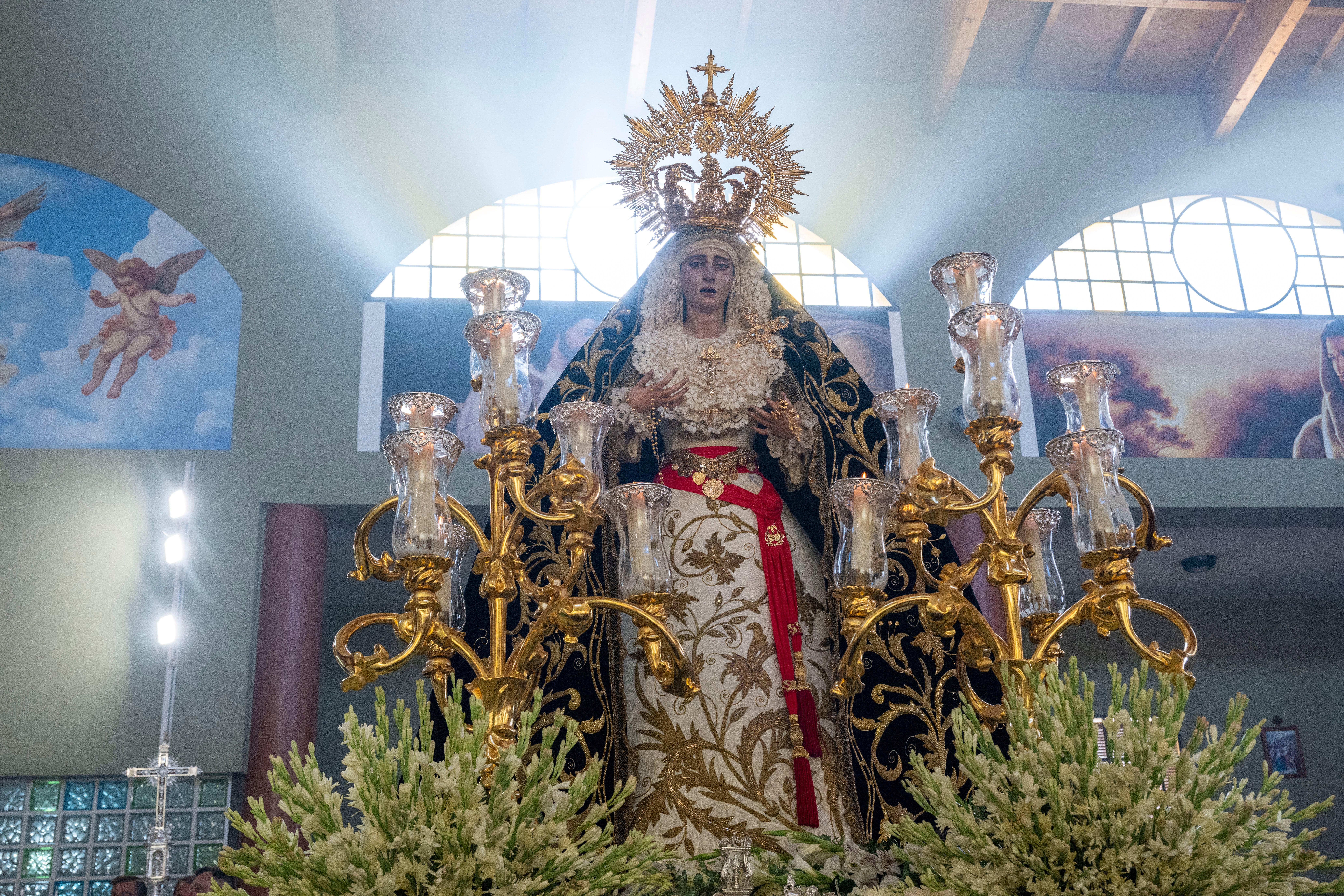 El rosario de la aurora de la Virgen de los Dolores del Cerro, en imágenes