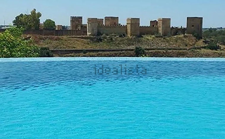 Imagen principal - Vistas y zona exterior de la vivienda