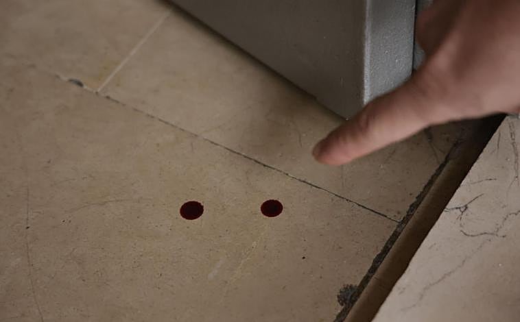 Imagen principal - Sangre en el portal de la calle Tigris