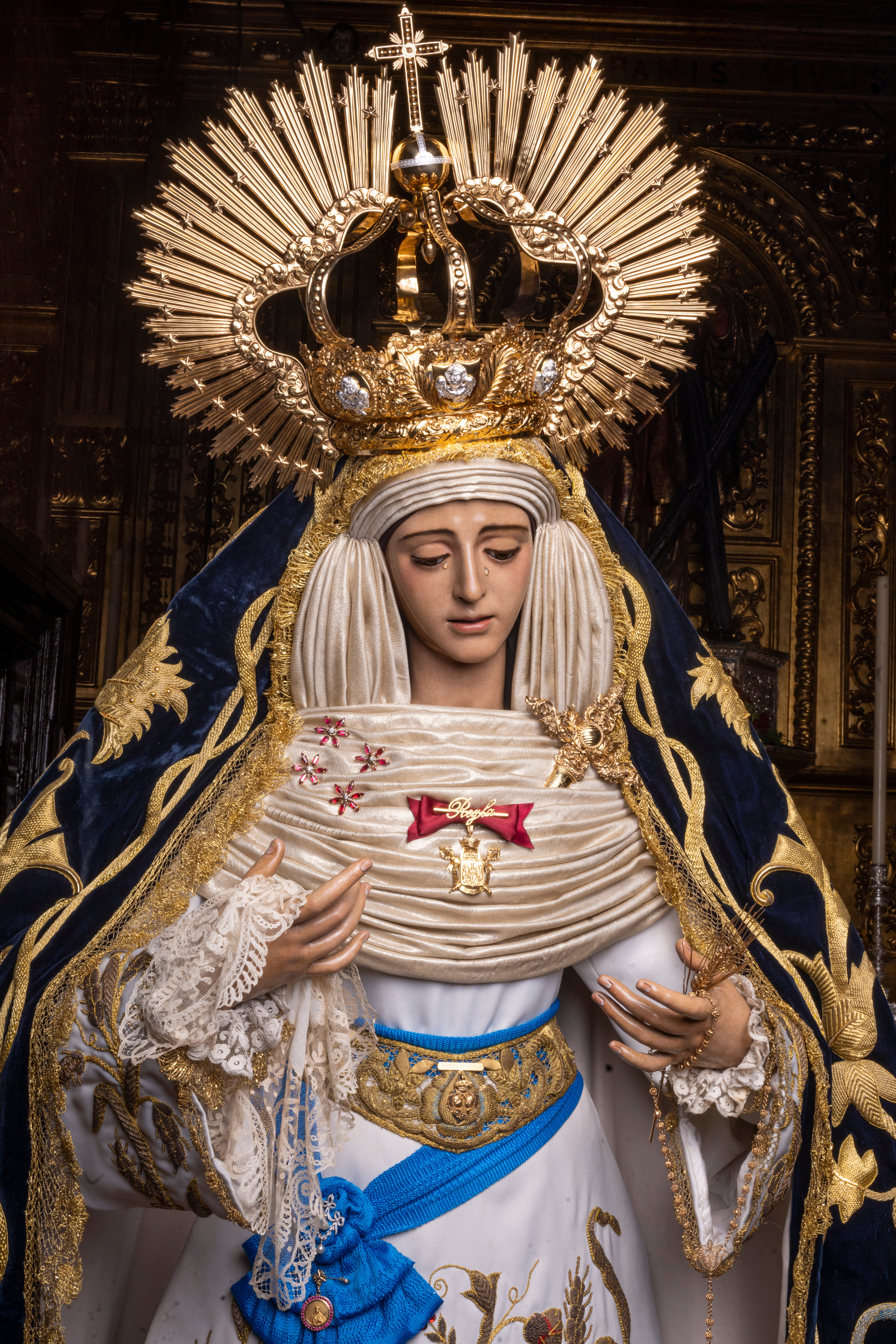 La reposición al culto de los titulares de los Panaderos, en imágenes