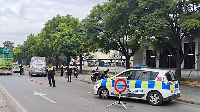 Local police officers carry out a check on the streets of Utrera in an archive image