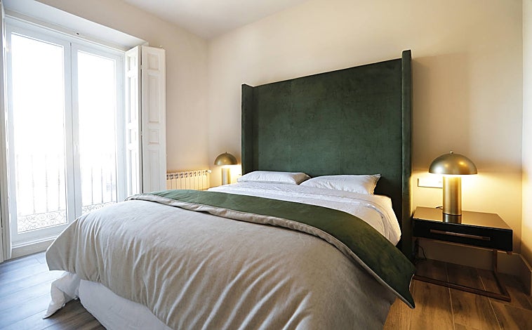 Imagen principal - Suite, baño principal y salón del piso de lujo