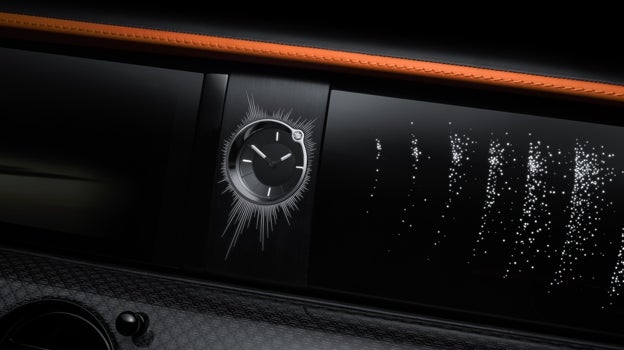 The dashboard clock features a 0.5 carat diamond