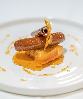 Secondary photo 2 - Duran Hotel room (above) and some of the dishes that can be tasted there such as meatballs and sweet sausages