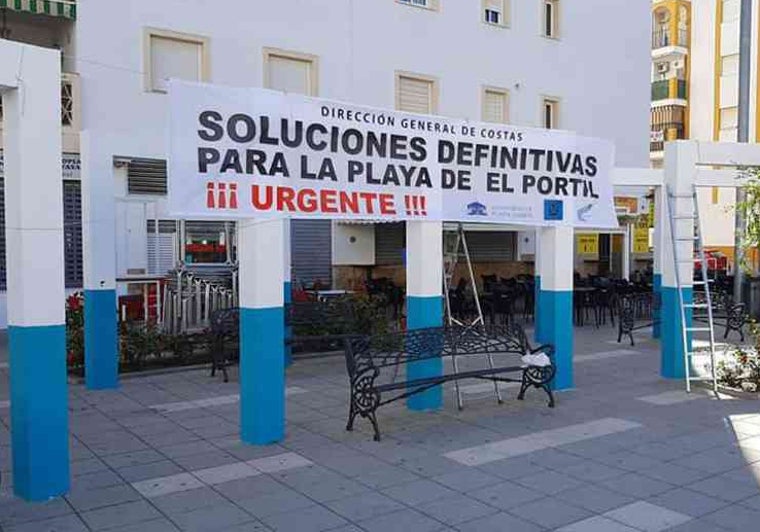 Pancarta pidiendo soluciones para El Portil