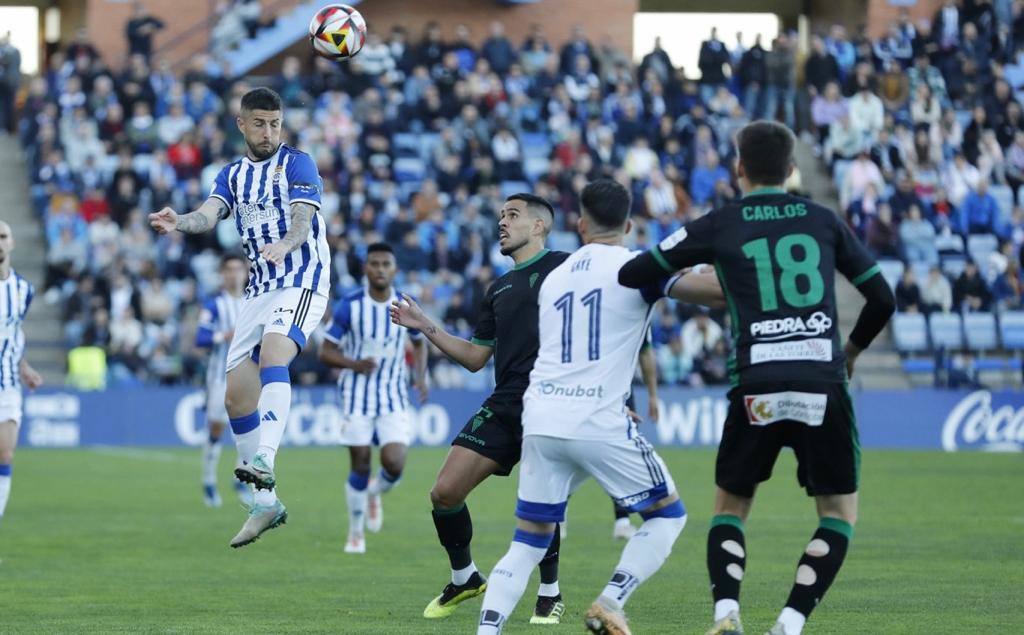 Las mejores imágenes del Recreativo-Córdoba en el césped y en la grada