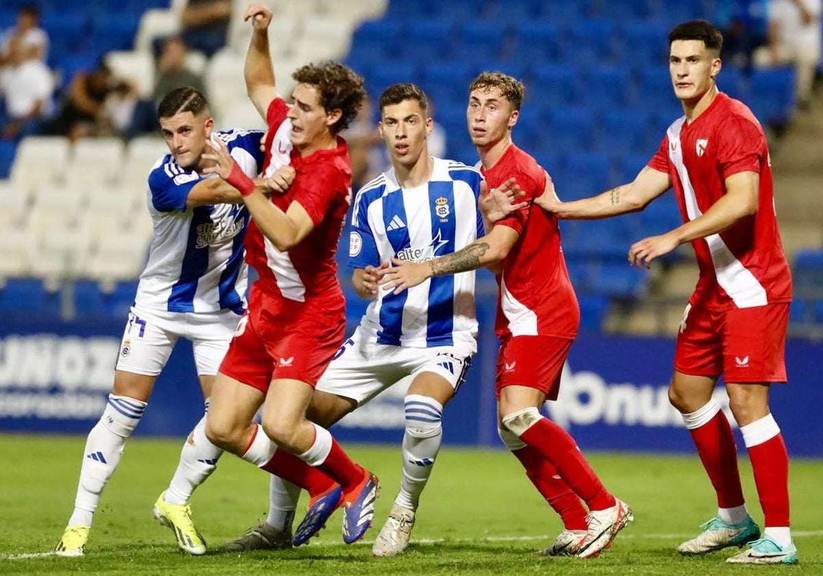 David del Pozo y Sergi Armero en un lance del pasado Recreativo-Sevilla Atlético