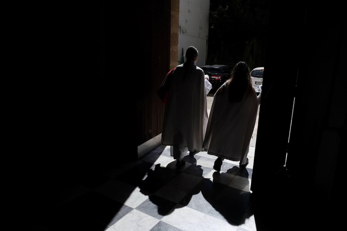 Fotos: la Borriquita ya luce en procesión en este Domingo de Ramos