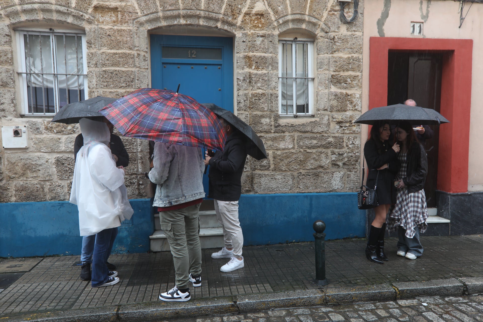 Fotos: La borrasca Jana agua el segundo Domingo de Carnaval en Cádiz