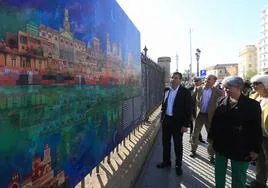La exposición 'Las Islas Soñadas' ofrece en la verja del muelle de Cádiz un recorrido por la ciudad