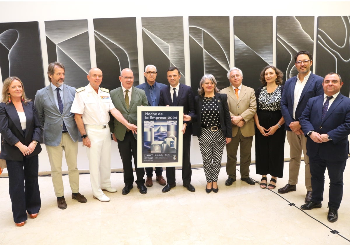 Foto de familia en la CEC con el cartel anunciador