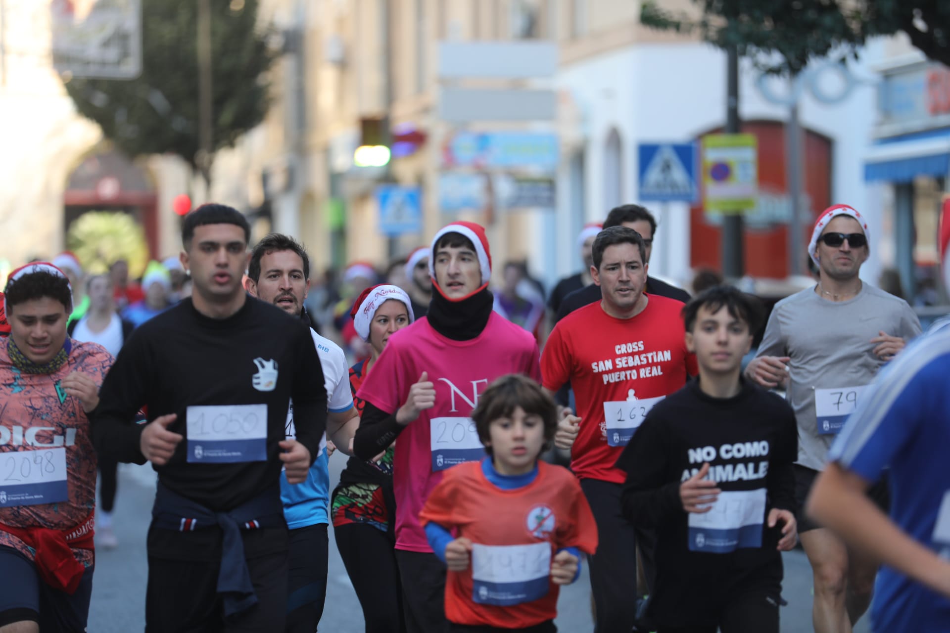 Fotos: El Puerto se entrega a su II San Silvestre