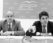 A.M  Los dirigentes del PP Fernando Domínguez Palomo y Luis García