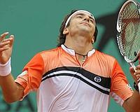 Tommy Robredo se lamenta del triunfo de Federer. /AP