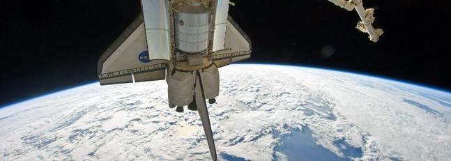 La lluvia obliga a los tripulantes del Discovery a esperar a mañana para volver a la Tierra