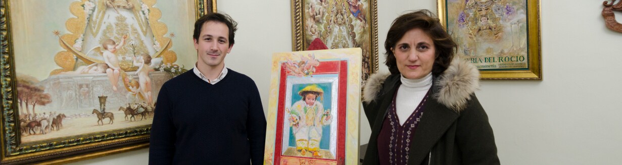 José Miguel Saavedra, delegado de Formación de la Matriz y Juana Acosta la artista almonteña artífice de la felicitación navideña