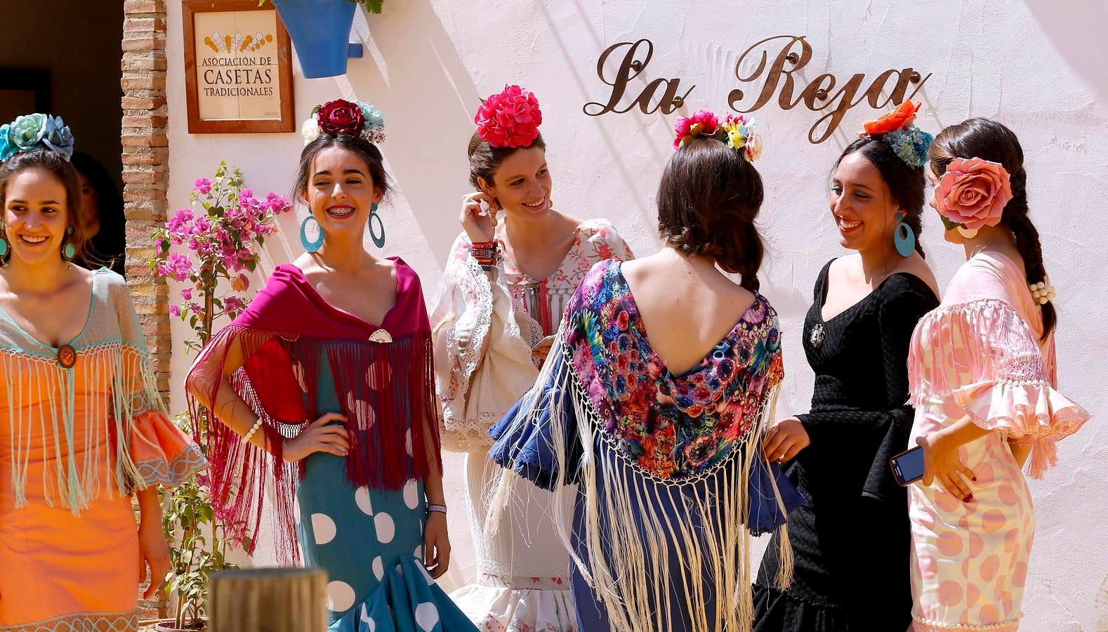 En imágenes, un jueves de Feria de sonrisas brillantes