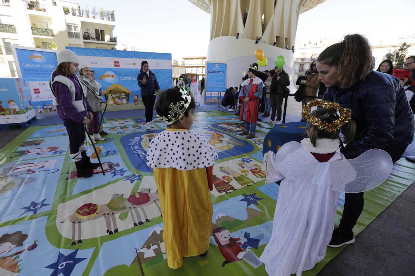 Los niños hacen el «Caminito de Belén» en Sevilla