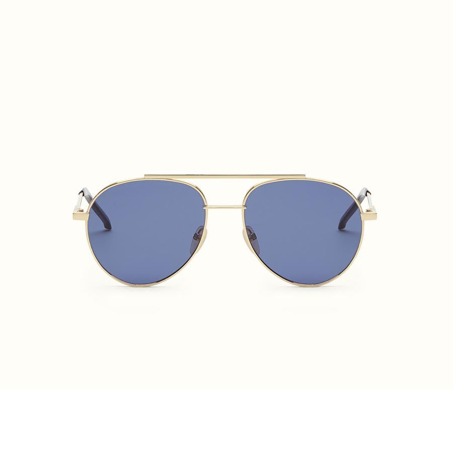Gafas de sol modelo QBIC en color beige y azul (480€)