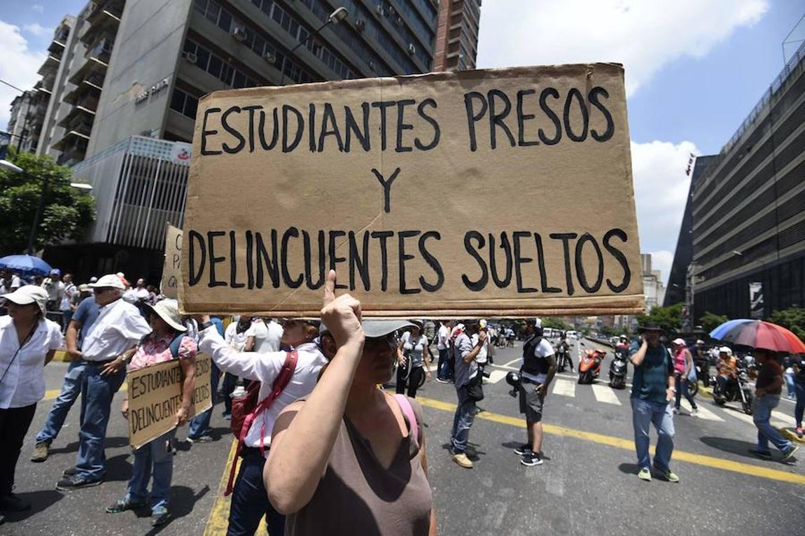 Manifestantes en Caracas contra el Gobierno de Maduro. 