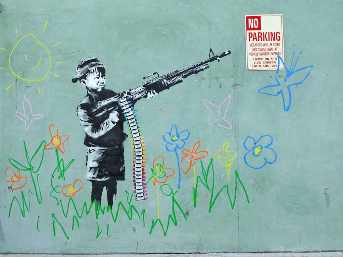 Balas de cera. El «Niño soldado» de Banksy apareció en una pared en Los Ángeles en 2011