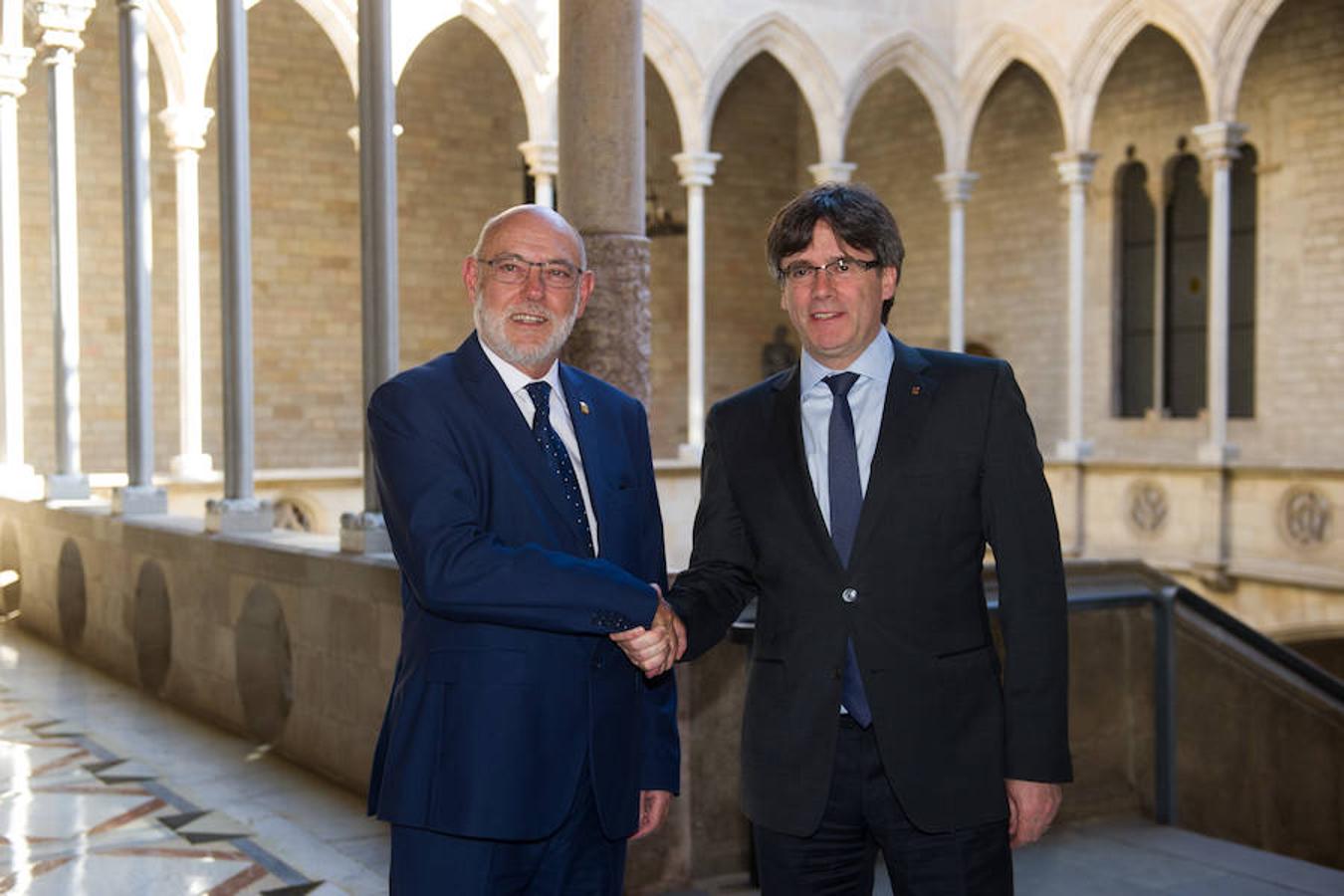 Junto al expresidente de la Generalitat, Carles Puigdemont. 