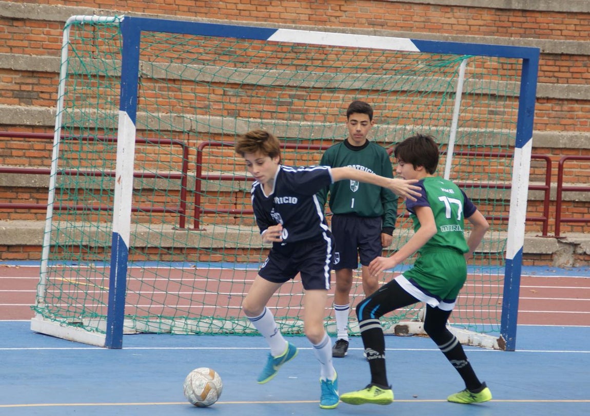 Las mejores imágenes del partido de fútbol sala cadete masculino entre San Patricio Soto Azul y Maristas Chamberí