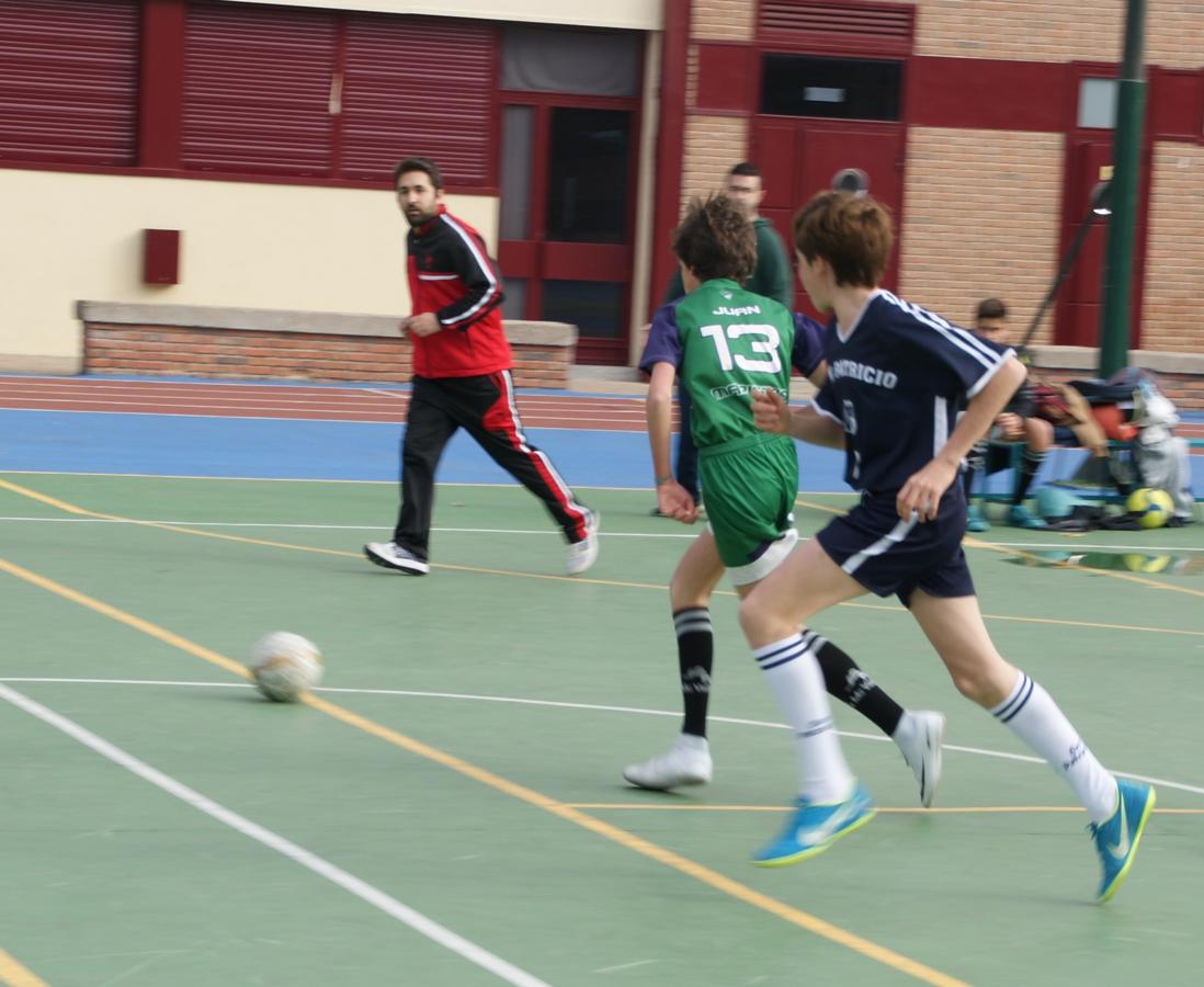 Las mejores imágenes del partido de fútbol sala cadete masculino entre San Patricio Soto Azul y Maristas Chamberí