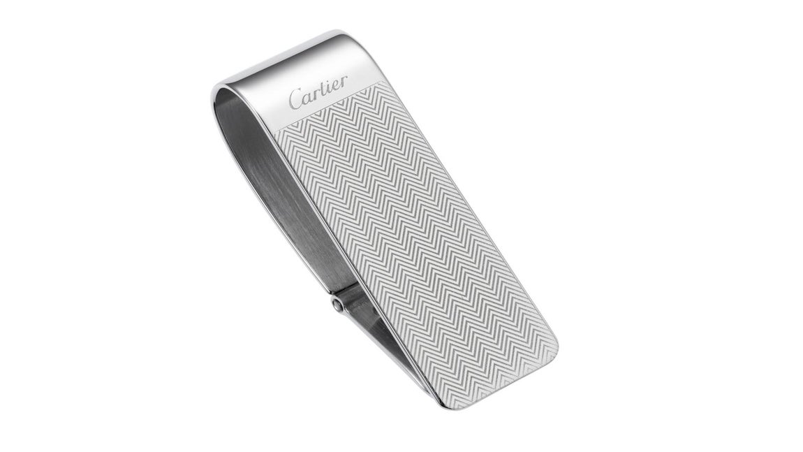 Clip de billetes. La organización es fundamental para cualquier caballero, sobre todo en lo que al bolsillo se refiere. Los clips para billetes no sólo son prácticos sino también elegantes y distinguidos. El artículo de la imagen es de Cartier y cuesta 243 euros