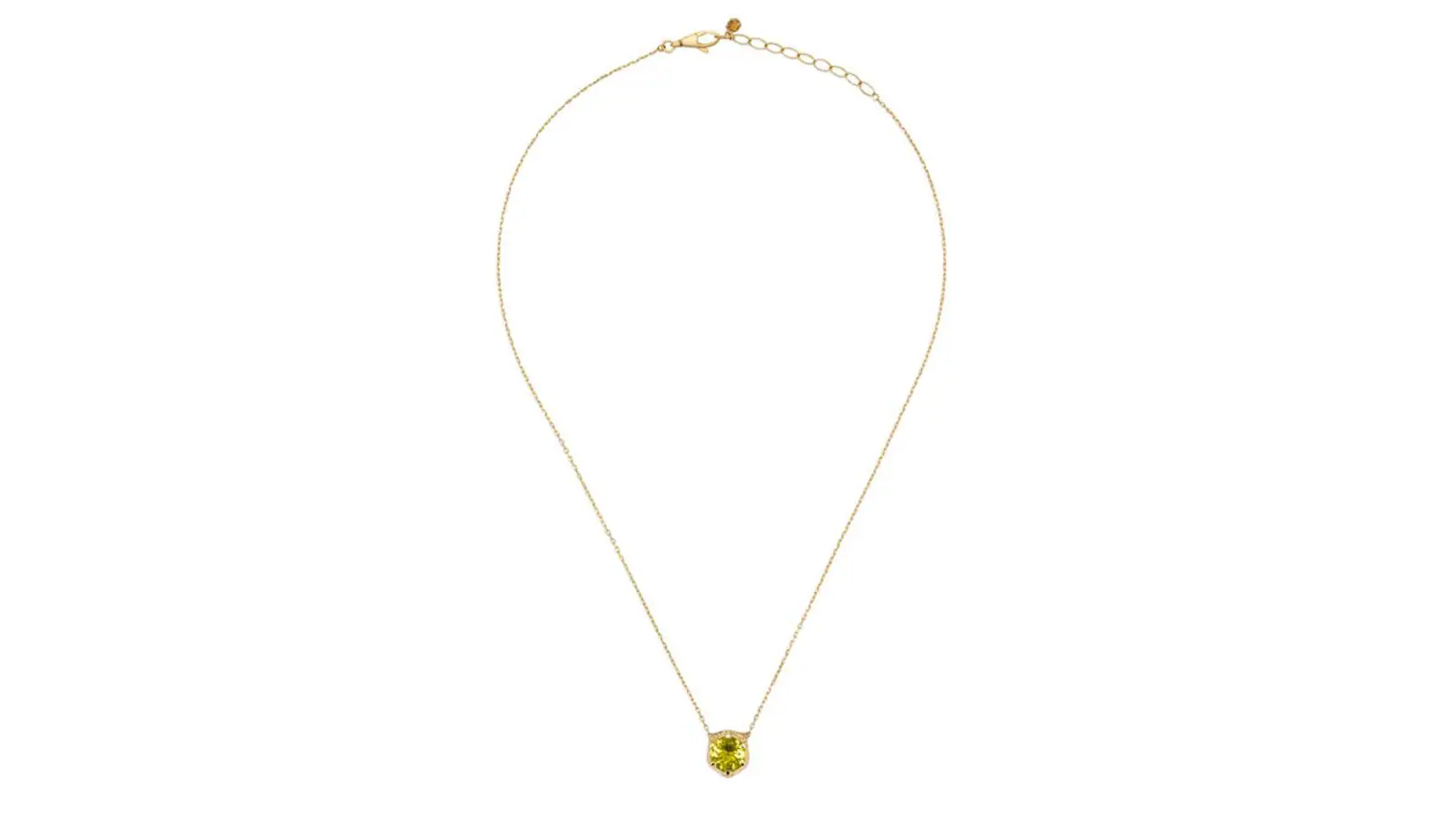 Gucci. Colgante en oro amarillo (42 cm) con motivo de Cabeza de Felino con parte trasera en berilo amarillo y diamantes engastados. (Precio: 2.200 €).