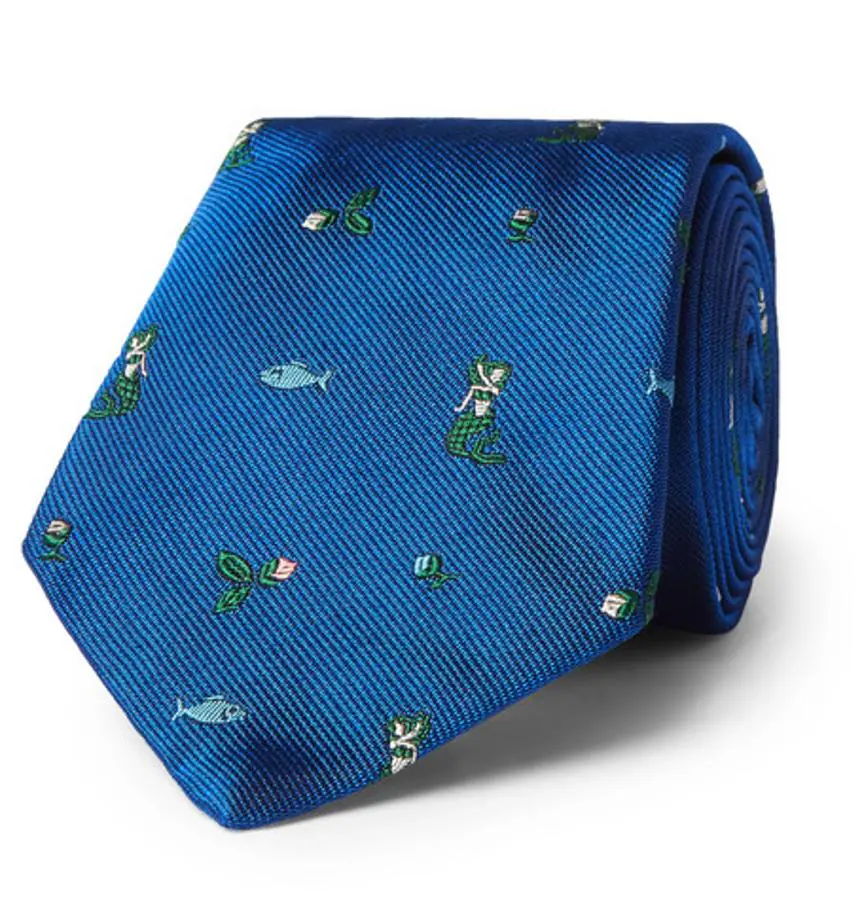Corbata de Prada. Prada firma las corbatas más atrevidas de la temporada como esta con motivos marinos (Precio: 120 euros)