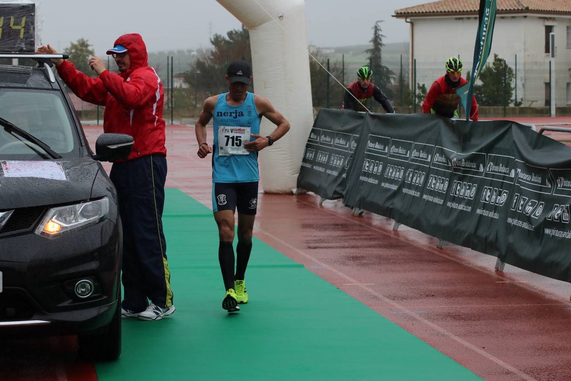 La lluviosa Media Maratón de Lucena, en imágenes