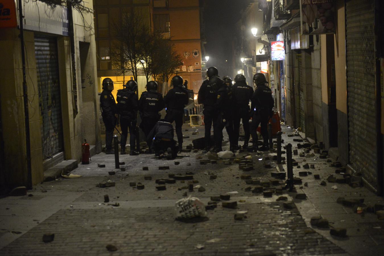 Los disturbios en Lavapiés, en imágenes