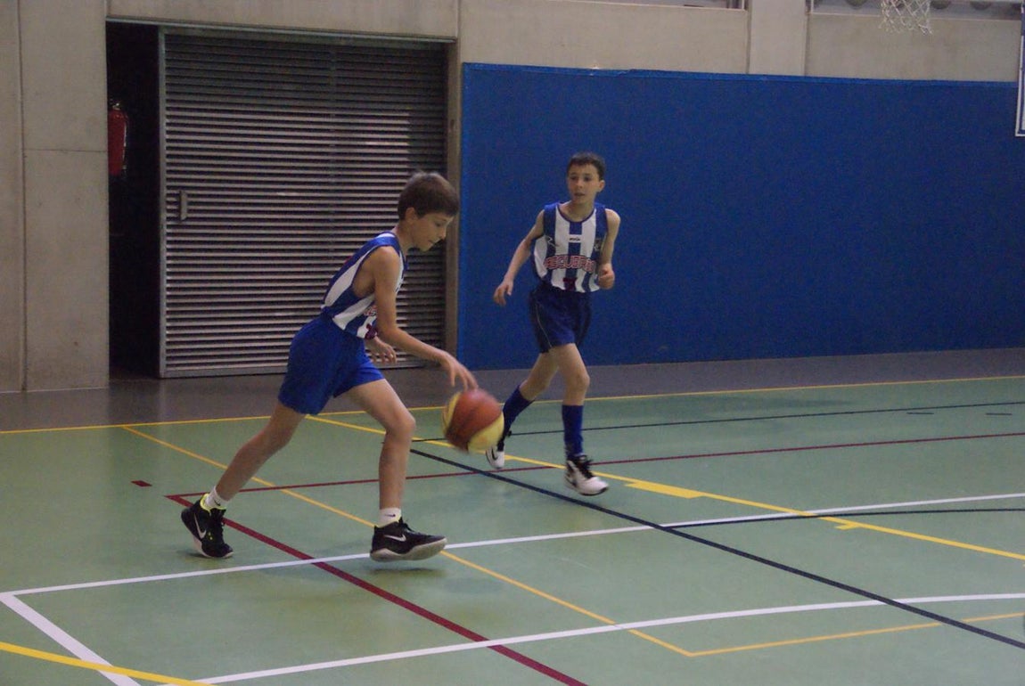 Las mejores imágenes del partido de baloncesto alevín masculino entre Ntra. Sra. Recuerdo y Sagrada Familia Jorge Juan
