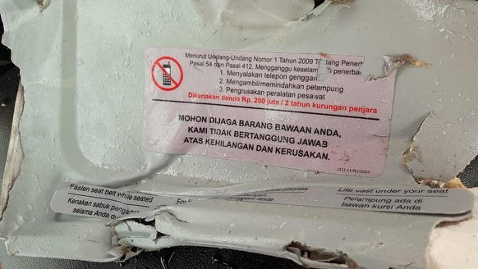 La búsqueda y rescate del avión siniestrado en el Mar de Java, en imágenes