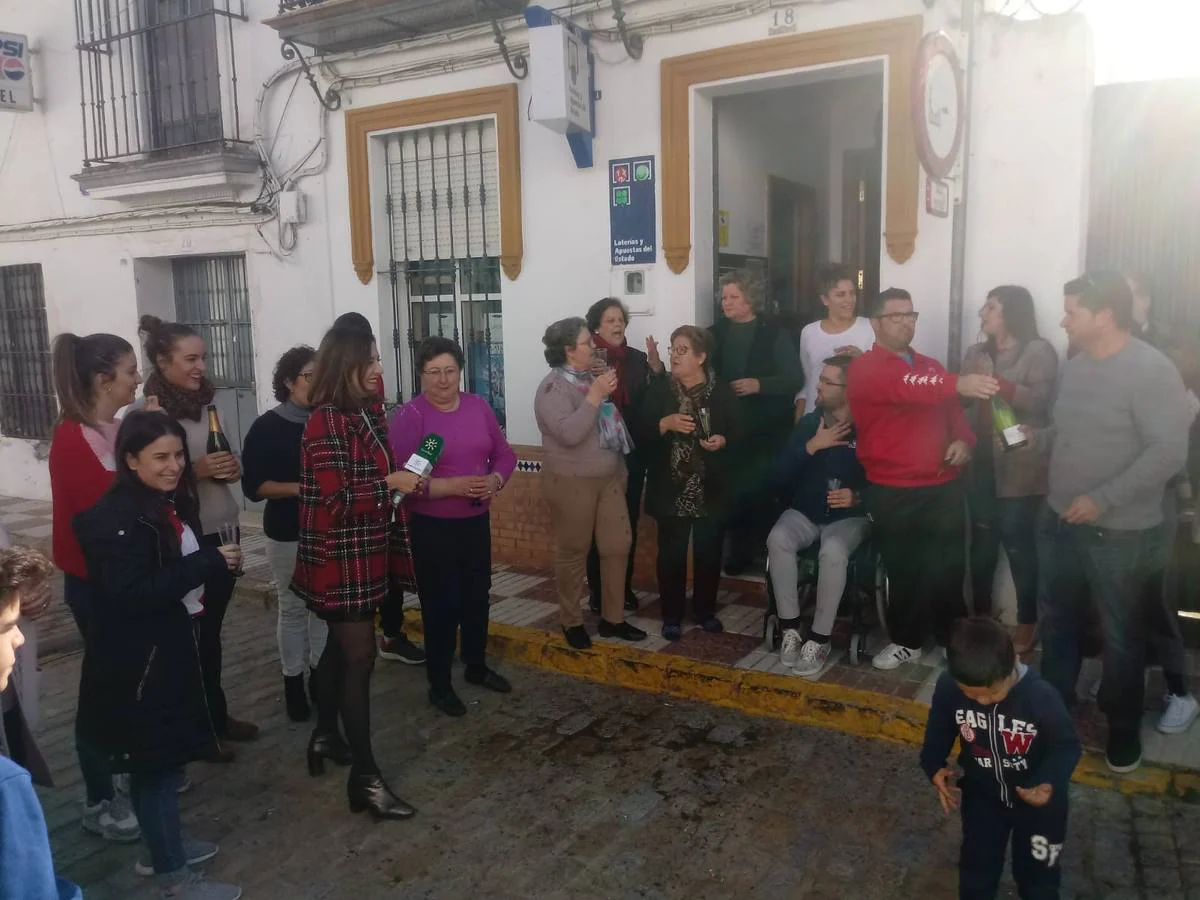 La celebración del Gordo de la Lotería de Navidad en Sevilla