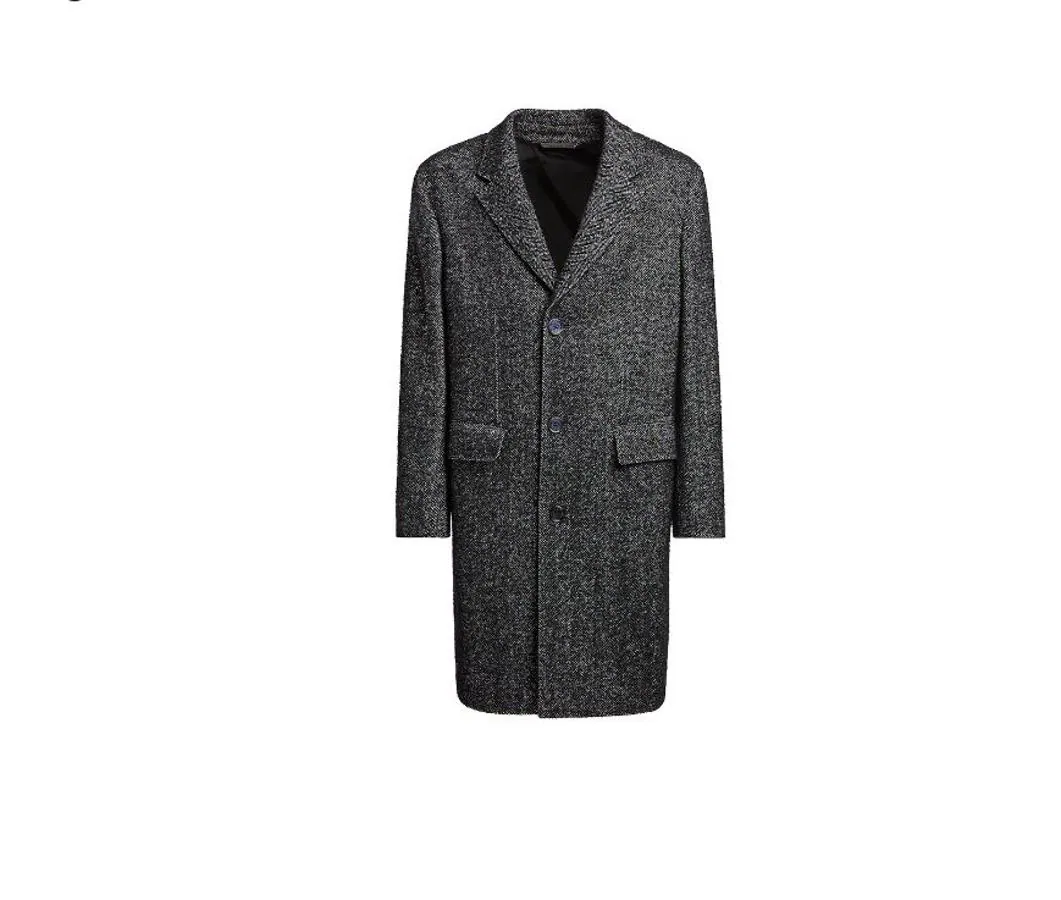Abrigo de lana en tweed de espiga de tonalidades grises de Ermenegildo Zegna. (Precio: 2.550 euros)
