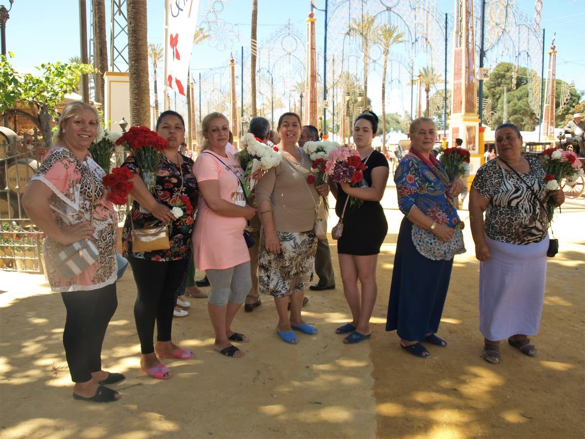 Vendedoras de claveles en la feria