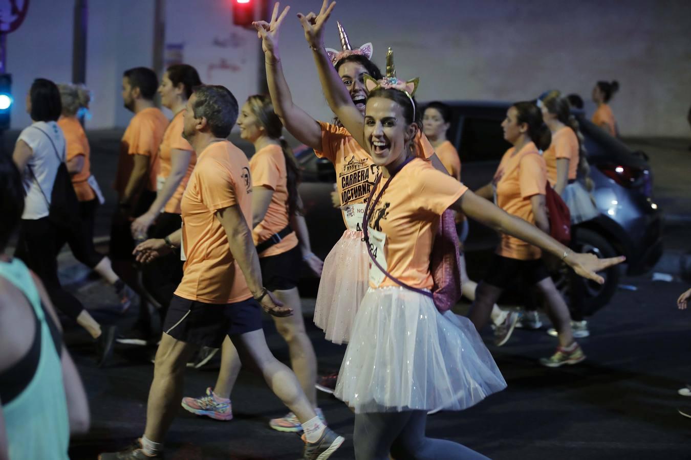 ¿Has corrido la Carrera Nocturna de Sevilla? Búscate en las fotos (III)