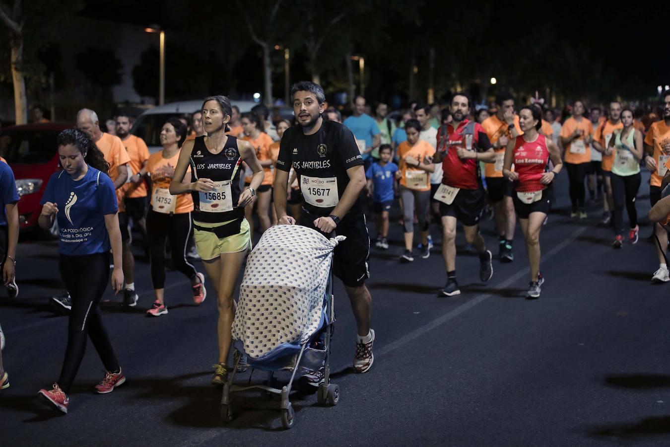 ¿Has corrido la Carrera Nocturna de Sevilla? Búscate en las fotos (III)