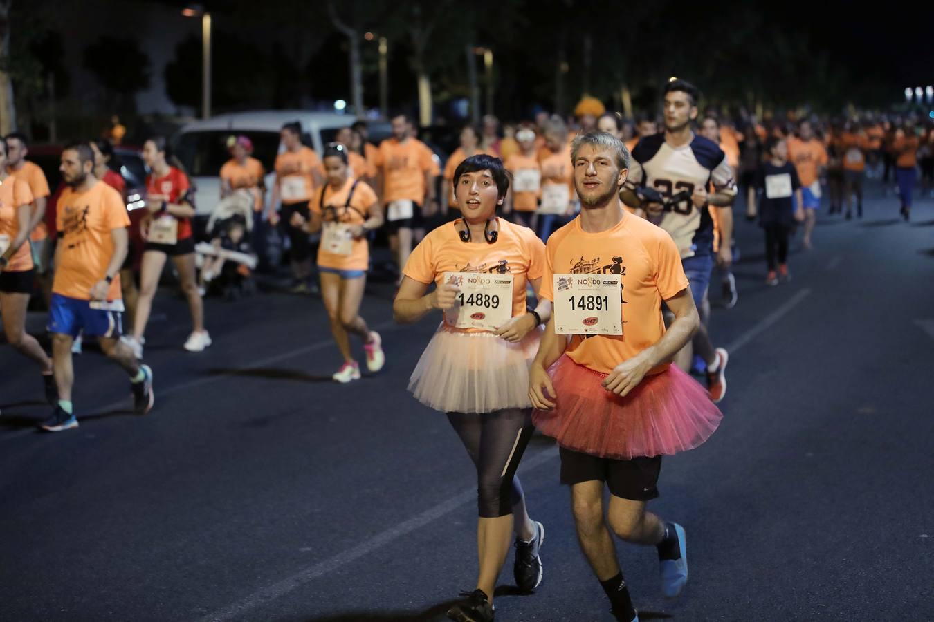 ¿Has corrido la Carrera Nocturna de Sevilla? Búscate en las fotos (III)