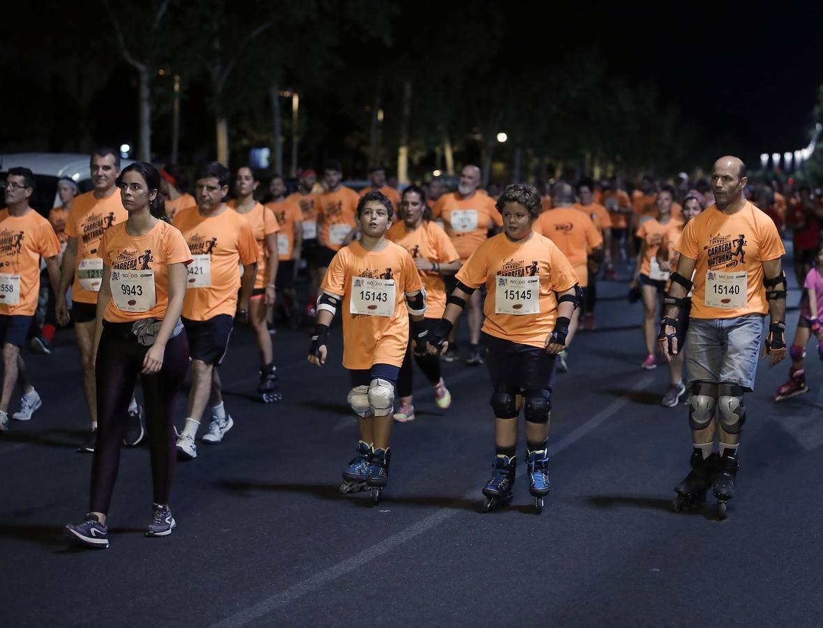 ¿Has corrido la Carrera Nocturna de Sevilla? Búscate en las fotos (III)