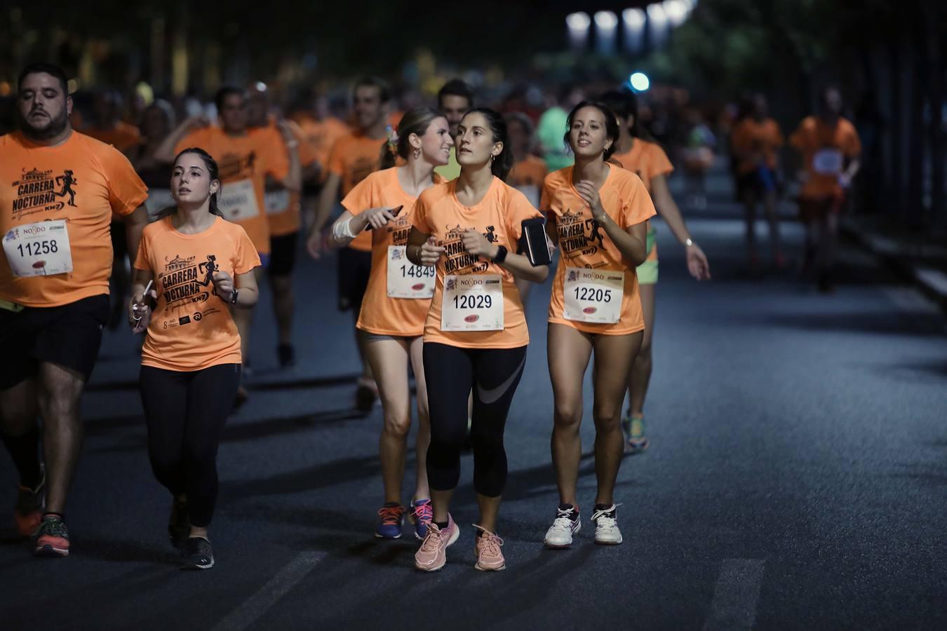 ¿Has corrido la Carrera Nocturna de Sevilla? Búscate en las fotos (III)