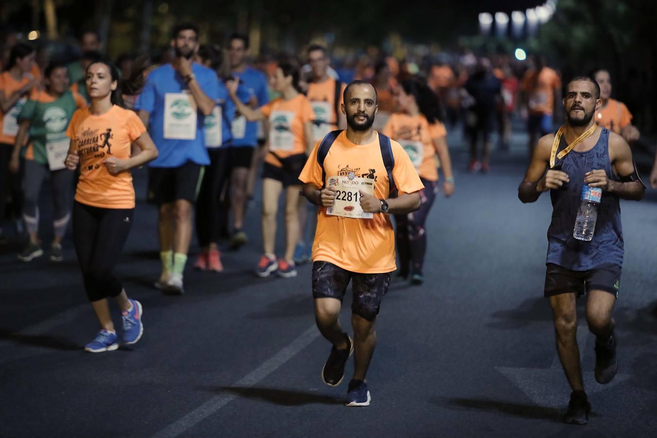 ¿Has corrido la Carrera Nocturna de Sevilla? Búscate en las fotos (III)