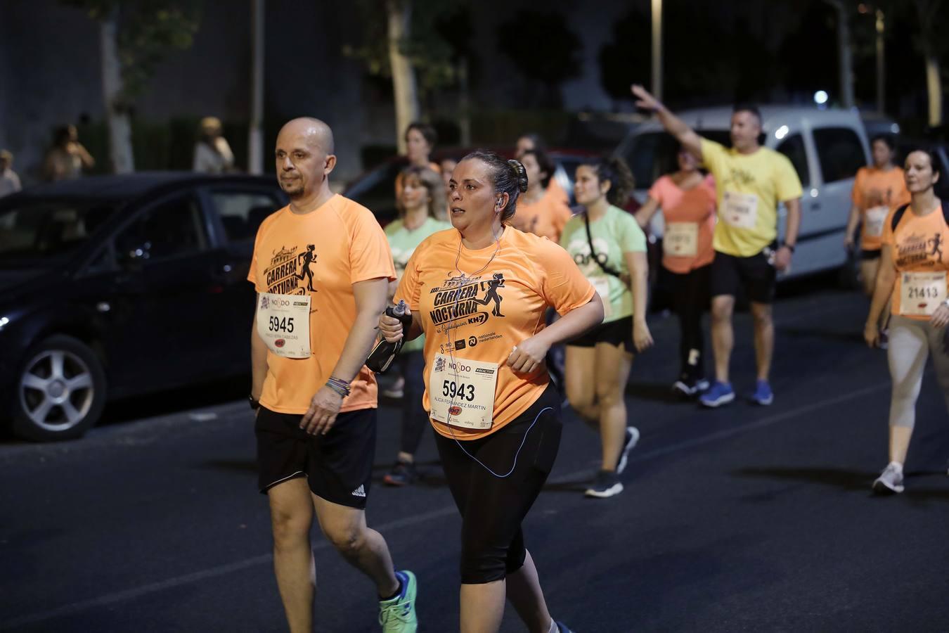 ¿Has corrido la Carrera Nocturna de Sevilla? Búscate en las fotos (III)