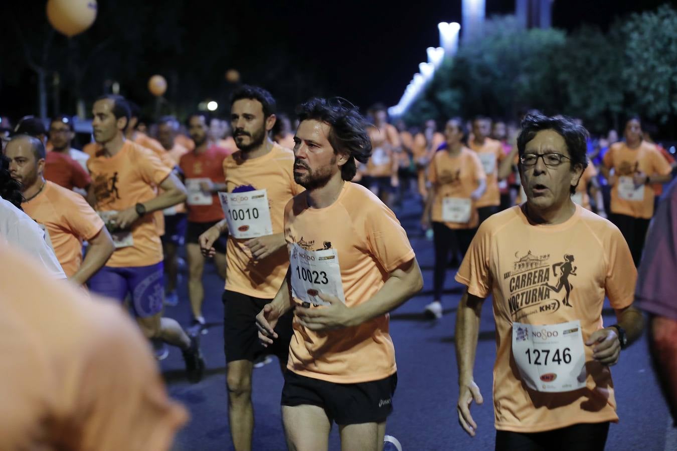 ¿Has corrido la Carrera Nocturna de Sevilla? Búscate en las fotos (V)