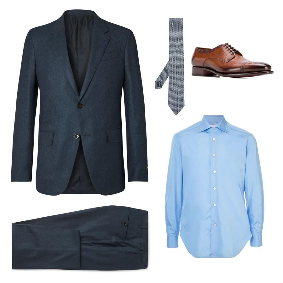 Look de Nochebuena con traje y corbata. Si eres de gustos clásicos, no renuncies a él en esta cena y apuesta por él como merece. Un traje de Ermenegildo Zegna azul marino (Precio: 3 300 €) con una camisa azul de Kiton (Precio: 1182 €), una corbata estampada de Salvatore Ferragamo (Precio: 183 €) y unos zapatos marrones de Santoni (Precio: 872 €) son la mejor combinación.