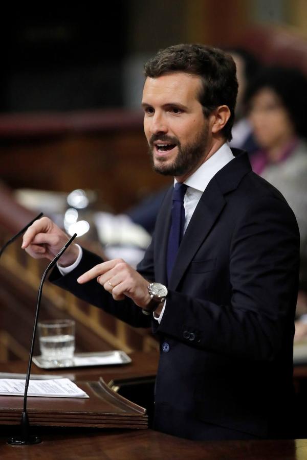 Las imágenes de la primera sesión de investidura. El presidente del PP, Pablo Casado, durante su intervención en el Congreso de los Diputados en la primera jornada de la sesión de investidura de Pedro Sánchez como presidente del Gobierno